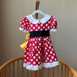 Beautiful Etsy Disney Minnie Mouse dress, 2T, with black tights and yellow shoes